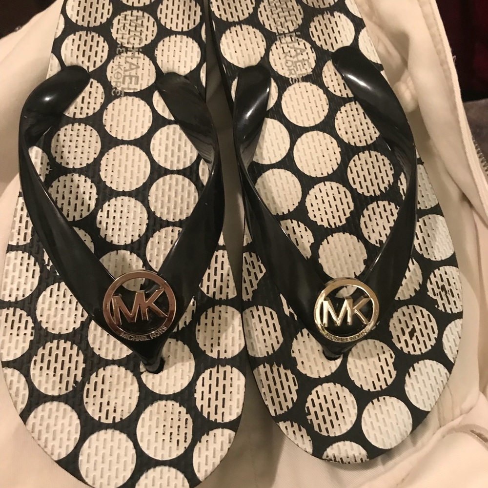 Michael Kors flips